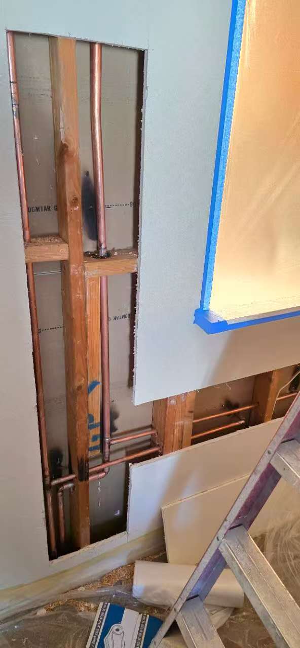 Water supply routing within the wall
