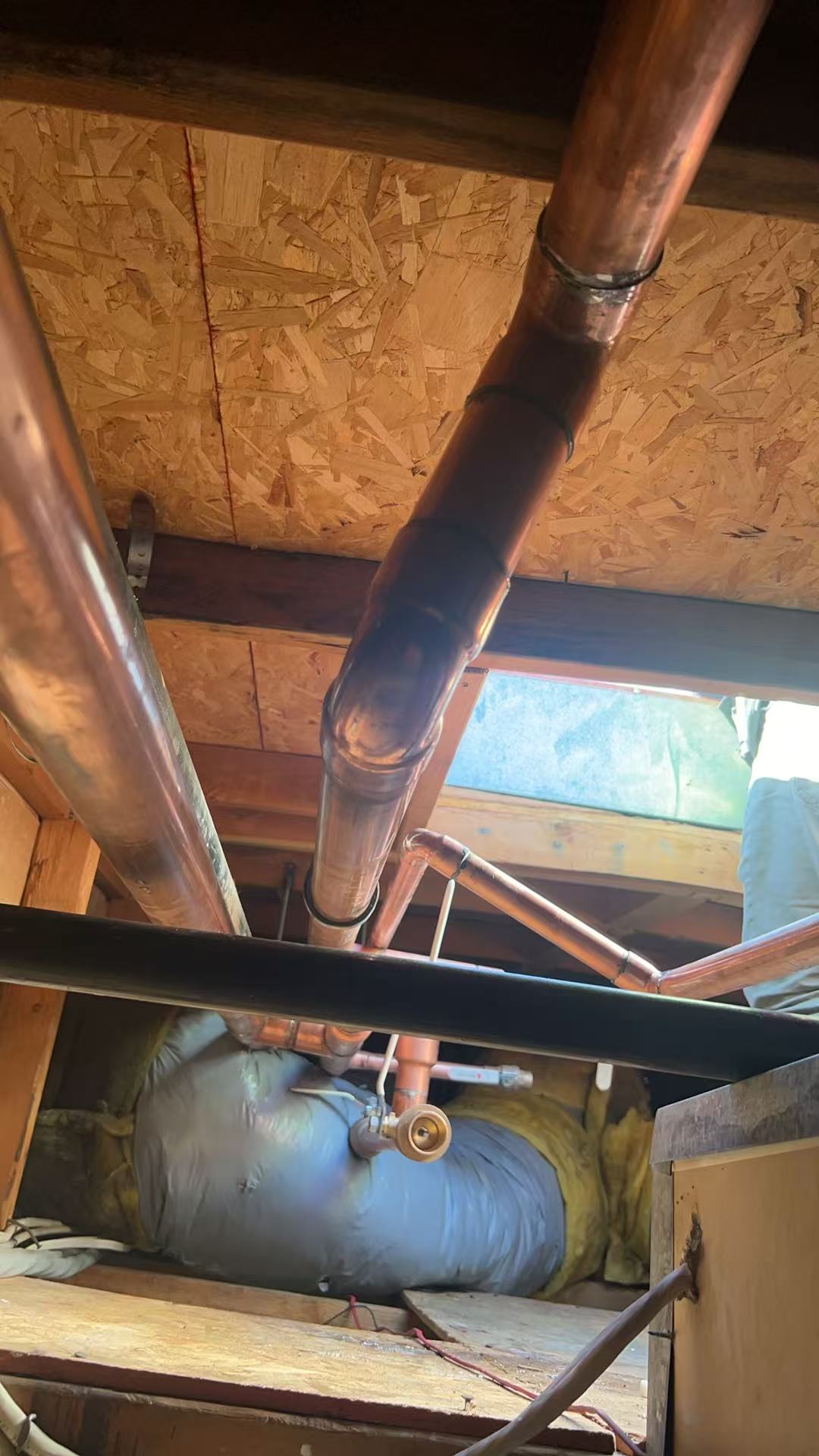 Overhead copper pipe installation