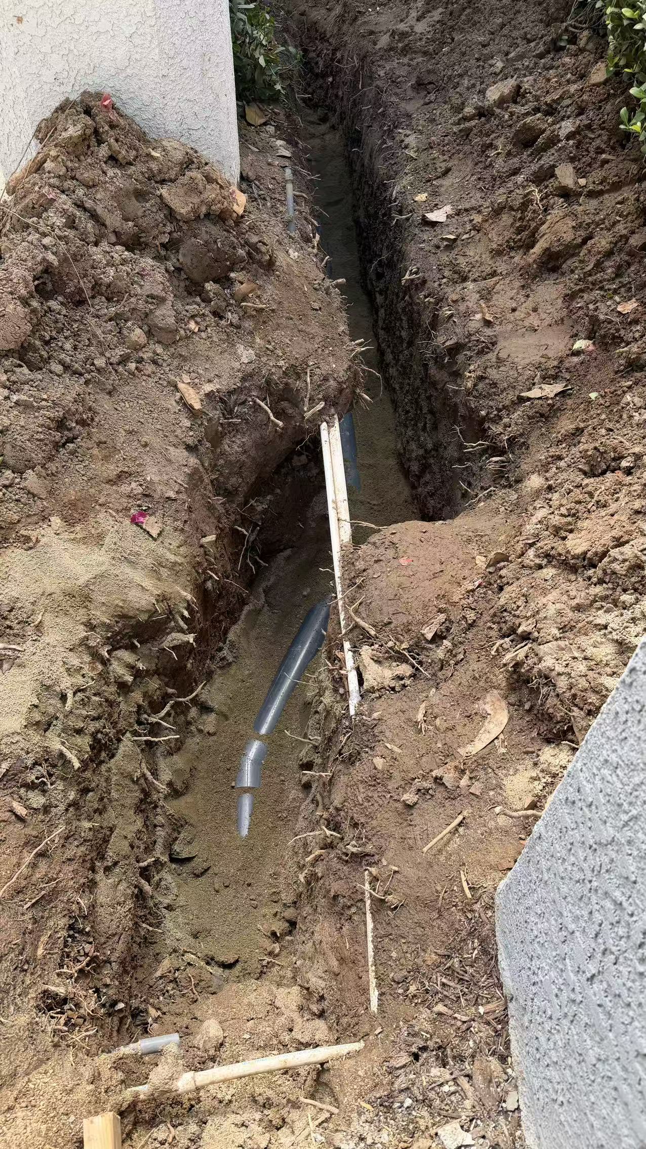 Pipe routing beside the building