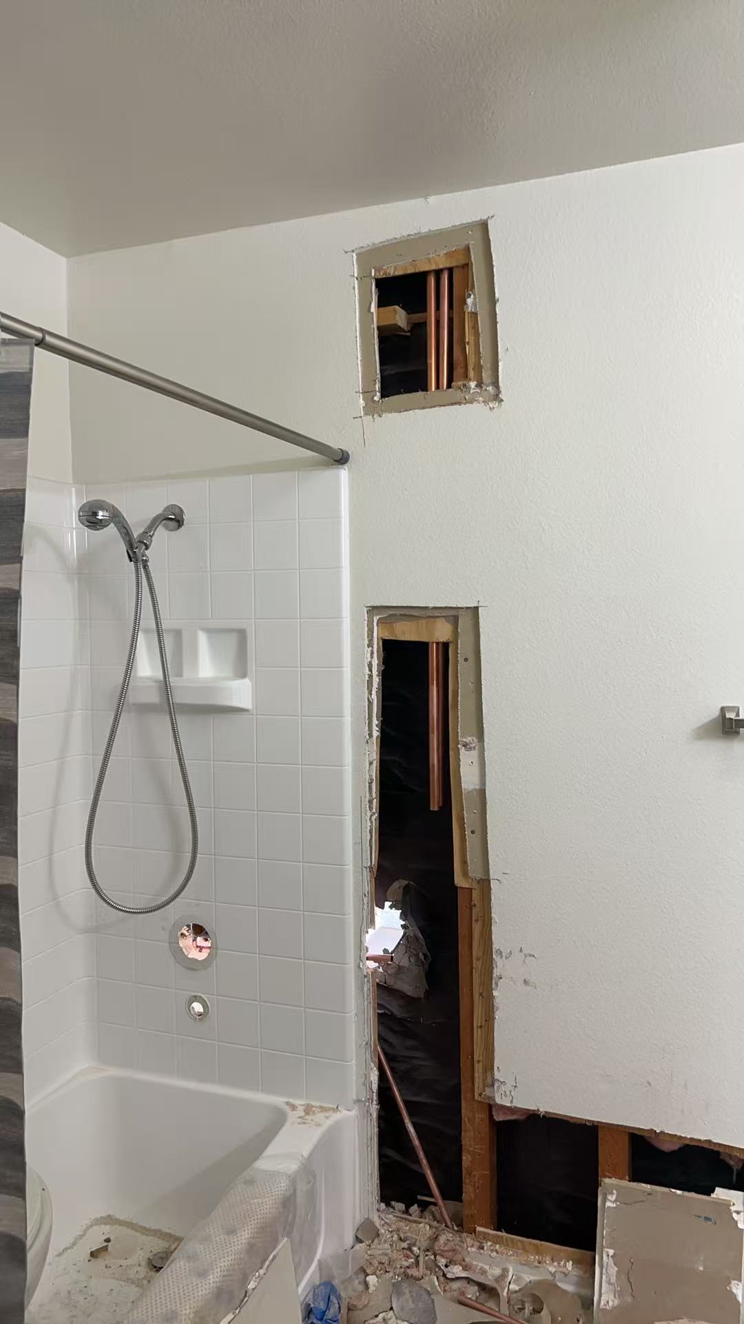 Bathroom wall access during repiping