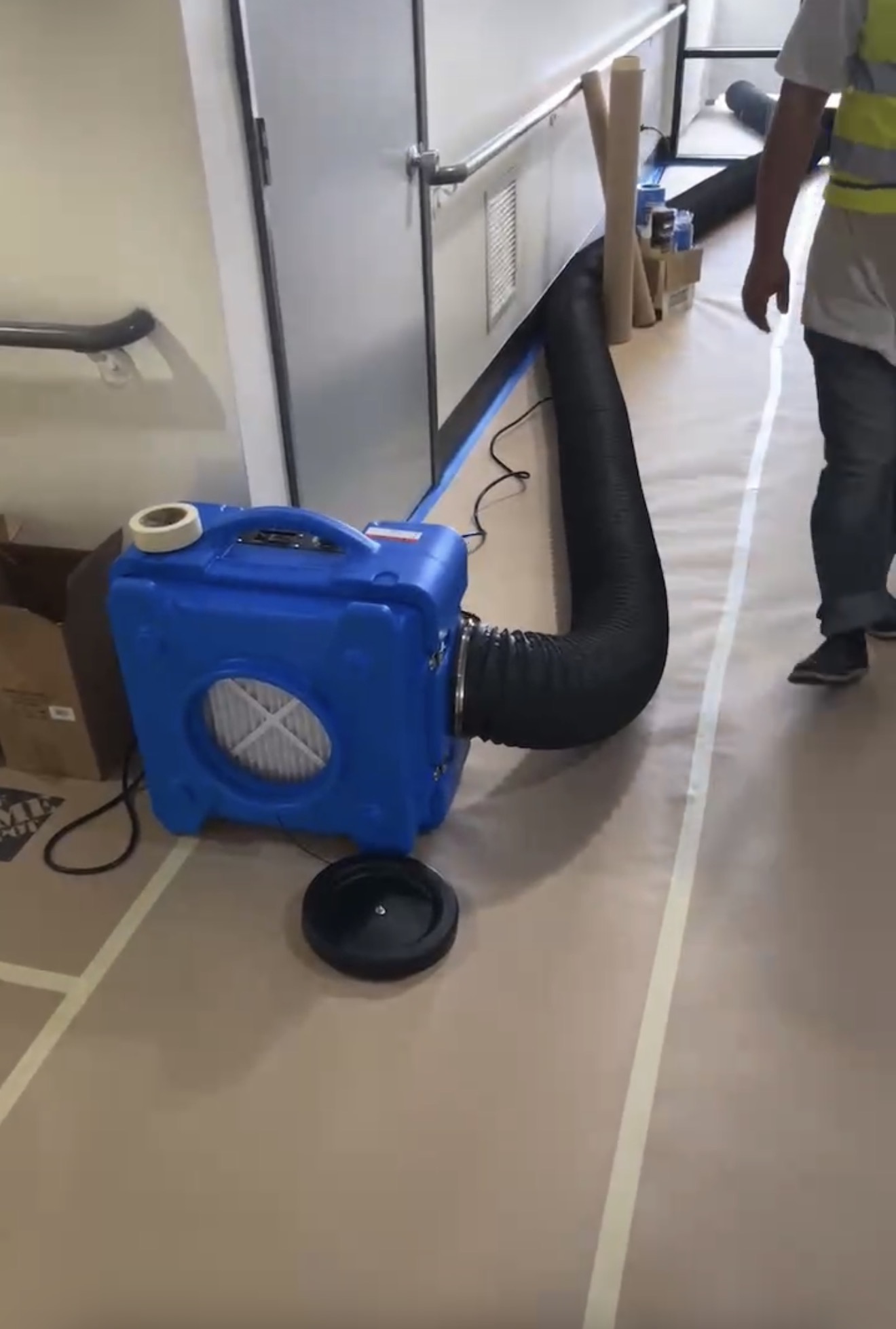 Floor protection and air filtration equipment in the work area